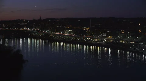 Flying up the Potomac and across Key Bridge at night; Georgetown on right. Shot Vídeos de archivo 59193310