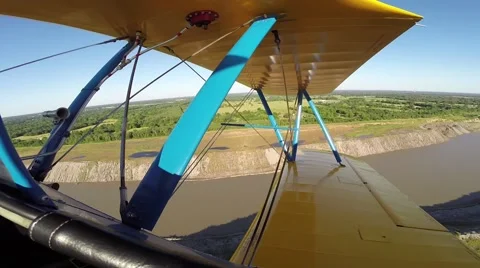 Flying In PT-17 Stearman Biplane Over Trees 動画素材 64355993