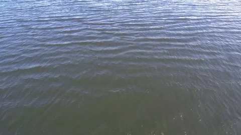 Flying the quadcopter over the water. Stock Footage 94909537