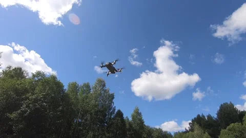 Flying quadcopter in the sky Stock-Footage 202249240