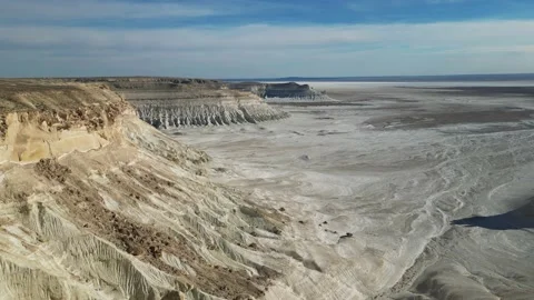 Flying on a quadrocopter with a drop-down view of the mountains washed away  Stock Footage 238191848