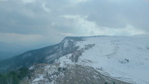 Flying a quadrocopter in the mountains. View of the cliffs from a height. ds. Stock Footage 167514995
