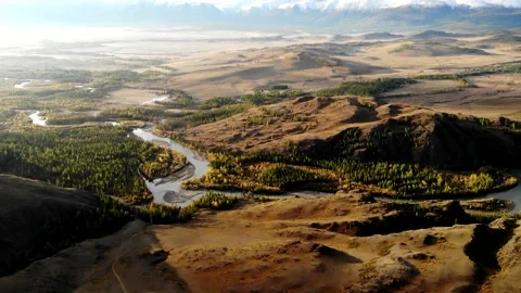 Flying on a quadrocopter over the steppe, a winding river, Stock Footage 160685750