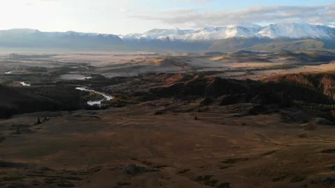 Flying on a quadrocopter over the steppe, a winding river Stock Footage 160685855
