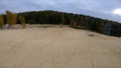 Flying on a quarry white sand forest Stock Footage 167065594