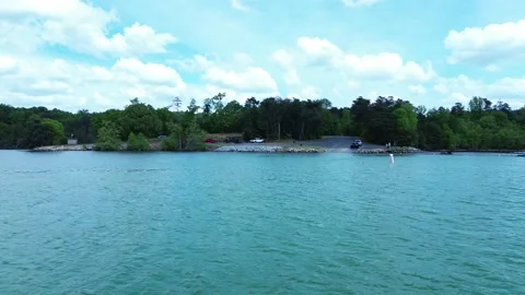 Flying Really Close to the Water on a Beautiful Lake 4k 스톡 동영상 239794317