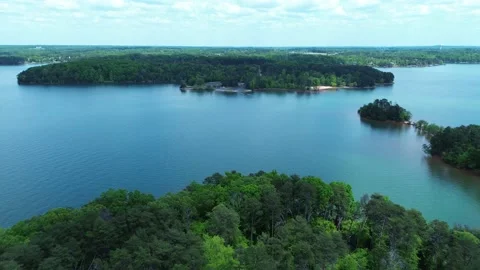 Flying Really Close to the Water on a Beautiful Lake 4k 스톡 동영상 239795083