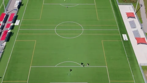 Flying reverse over soccer field Stock Footage 250422418