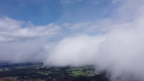 Flying  right in the middle and panning sidewards in the Clouds, Aerial View. Stock-Footage 139315257