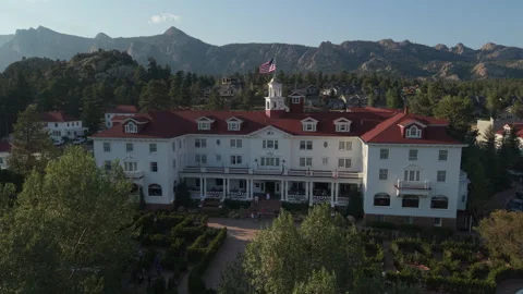 Flying right view of landmark Stanley Hotel in Estes Park, CO Stock Footage 341236634