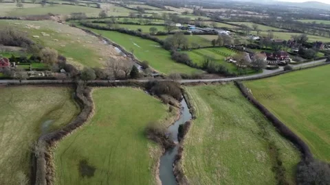 Flying up the River Adur towards Wineham Bridge Stock Footage 184649366