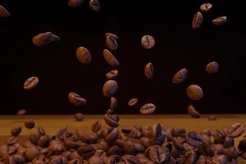 Flying roasted coffee beans drop in the air ,Roasted coffee beans on wooden.. Stock-Illustration