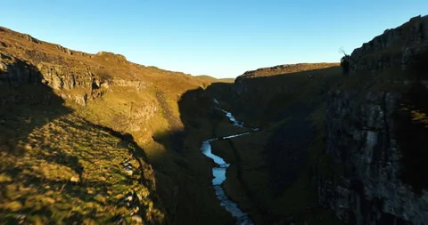 Flying in a rocky gorge Stock Footage 272769163