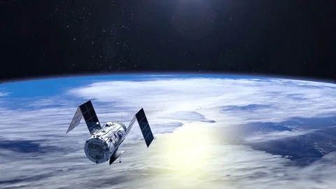 Flying satellite. The satellite quickly flies away. Solar panels are revealed Stock Footage 71726093