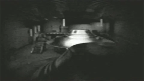 Flying Saucers Discs UFOs in Hangar old film Stock Footage 194862522