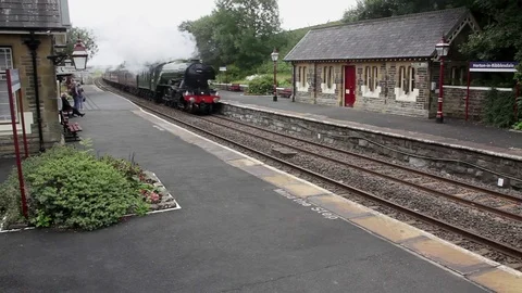 Flying Scotsman on excursion train at Horton in Ribblesdale railway station Stock Footage 80205883