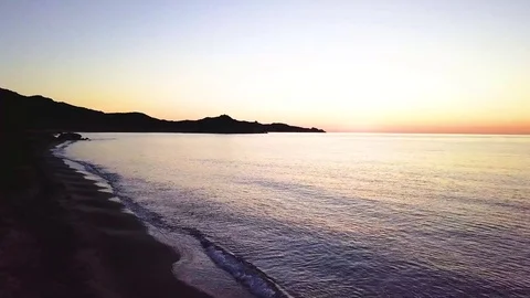 Flying on the sea at the sunrise Stock Footage 80605417