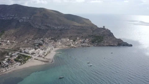 Flying shot looking over the stony beach from La Azohia in Spain Video stock 164240991