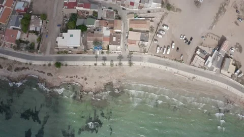Flying shot looking over the stony beach from La Azohia in Spain Stock-Footage 164241001