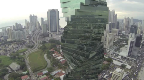 Flying up the side of a corkscrew building 库存影片 35680936