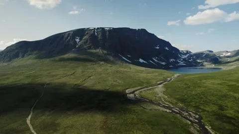 Flying Sideways Over the Tundra Landscape by Blåhøa Mountain in Norway Stock Footage 329259698