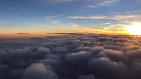 Flying in the sky during beautiful sunset and thick clouds Stock Footage 106143378