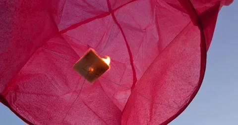 Flying in the sky fire paper lantern Stock Footage 133491120