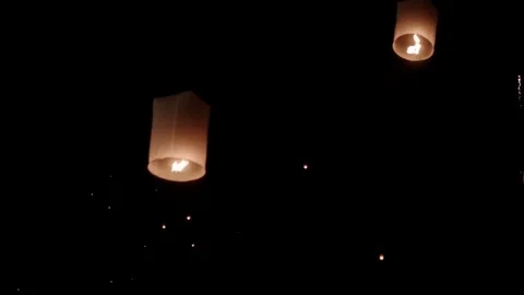 Flying Sky Lanterns in the Night Stock Footage 74420676