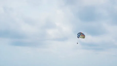 Flying skydiver on a background of cloudy sky. Stock Footage 118154479