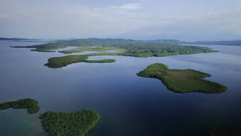 Flying slowly forward of a vast expanse of small islands in Panama  Video stock 276241545