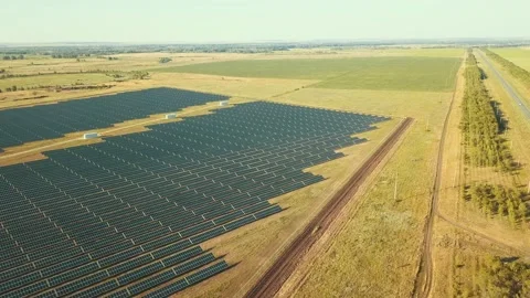 Flying slowly over the solar modules in Russia in the daylight Stock-Footage 135826562