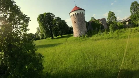 Flying up to a small castle and orbiting around it 스톡 동영상 243370696