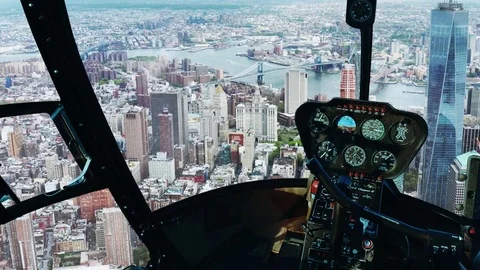 Flying in small helicopter over a big city 스톡 동영상 73685372