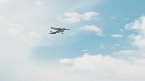 Flying small single prop Plane in the Blue sky 1080P Stock Footage