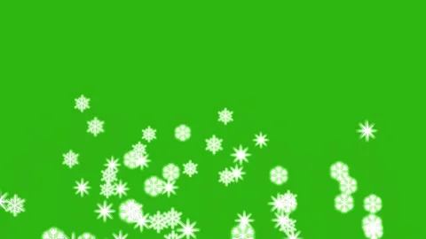 Flying snowflakes on a green screen Stock Footage 152631976
