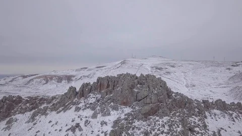 Flying to a snowy hill Stock Footage 102658523
