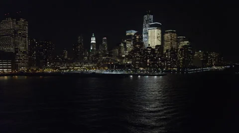 Flying south along the Hudson River at night, gaining altitude on approach to Stock Footage 59172174