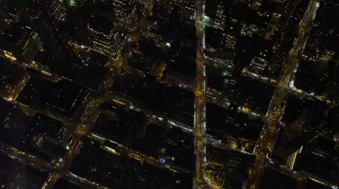 Flying southeast over Manhattan streets at night, south of Times Square. Shot in Stock Footage 59171576
