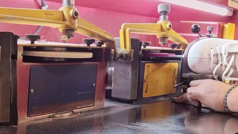 Flying sparks while sharpening a figure skate. Close-up of ice skate sharpened Stock Footage 247996067