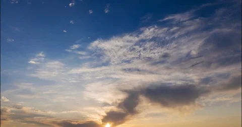 Flying  spindrift clouds at sunset Stock Footage 80018987