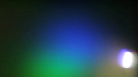 Flying spots of light in different colors Stock Footage 109404192