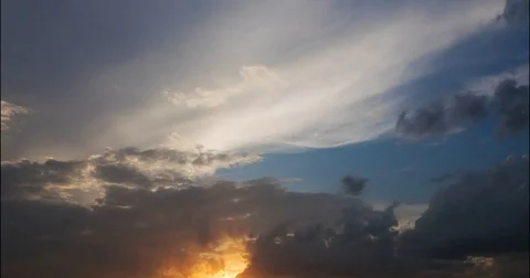 Flying  storm clouds at sunset Stock-Footage 80018577