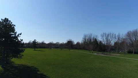 Flying Straight Up Opver Park With Pathways And Playground Near Neighborhood Stock Footage 121206740