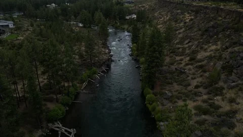 Flying Up Stream on Deschutes River in Bend Oregon Stock Footage 249819976