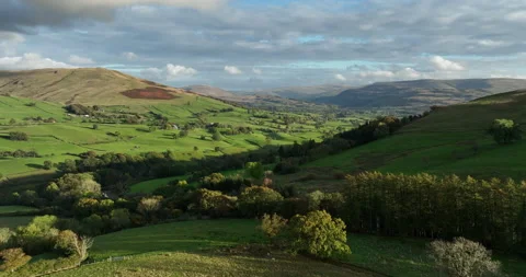 Flying in the sunlit valley Stock Footage 220126445
