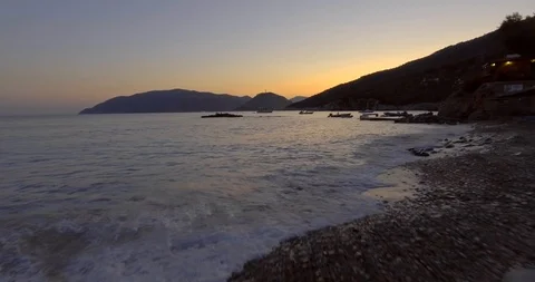 Flying in the sunset above the sea Stock Footage 86178909