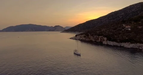 Flying in the sunset above the sea Stock Footage 86180053