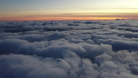 Flying at sunset on the clouds of gran canaria version 1 Video stock 121531116