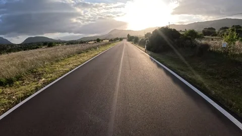 Flying into sunset onver the road 스톡 동영상 274932090