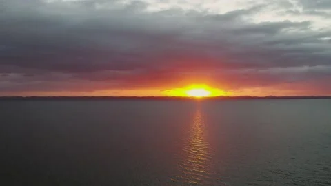 Flying into sunset over lake Stock Footage 186100725